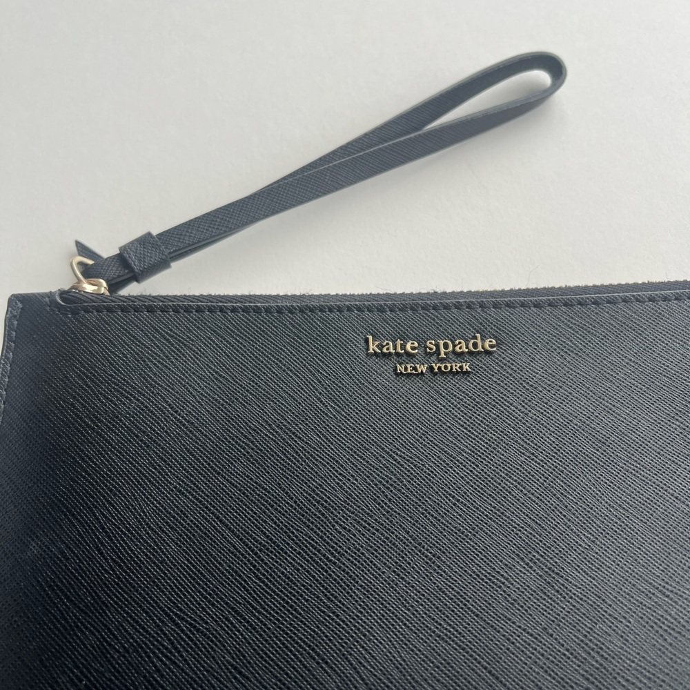 kate spade black saffiano leather wristlet with gold logo